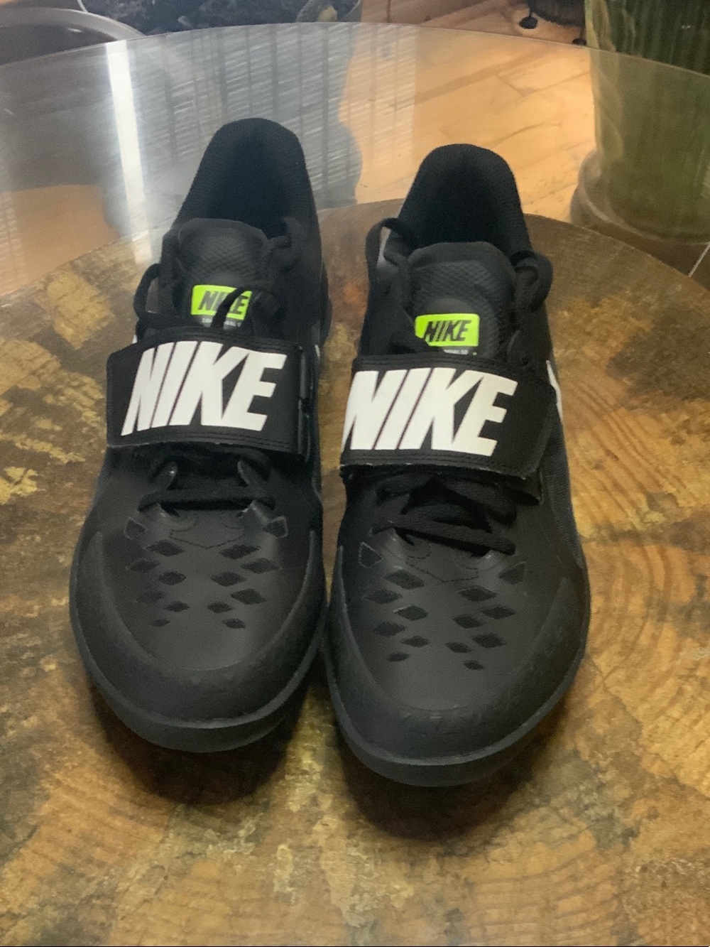 Nike Black Sneakers with White Strap and Neon Green Tongue Tab